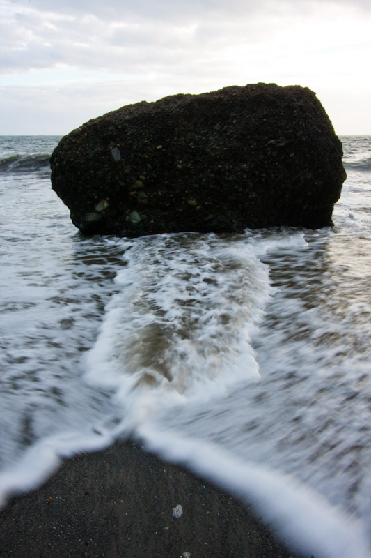 Waves Breaking Around Rock